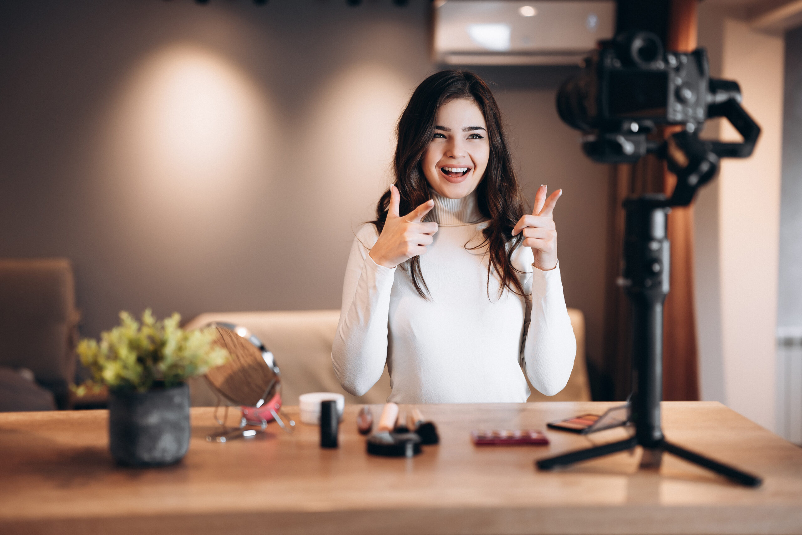 Beauty blogger filming makeup tutorial for influencer marketing campaign