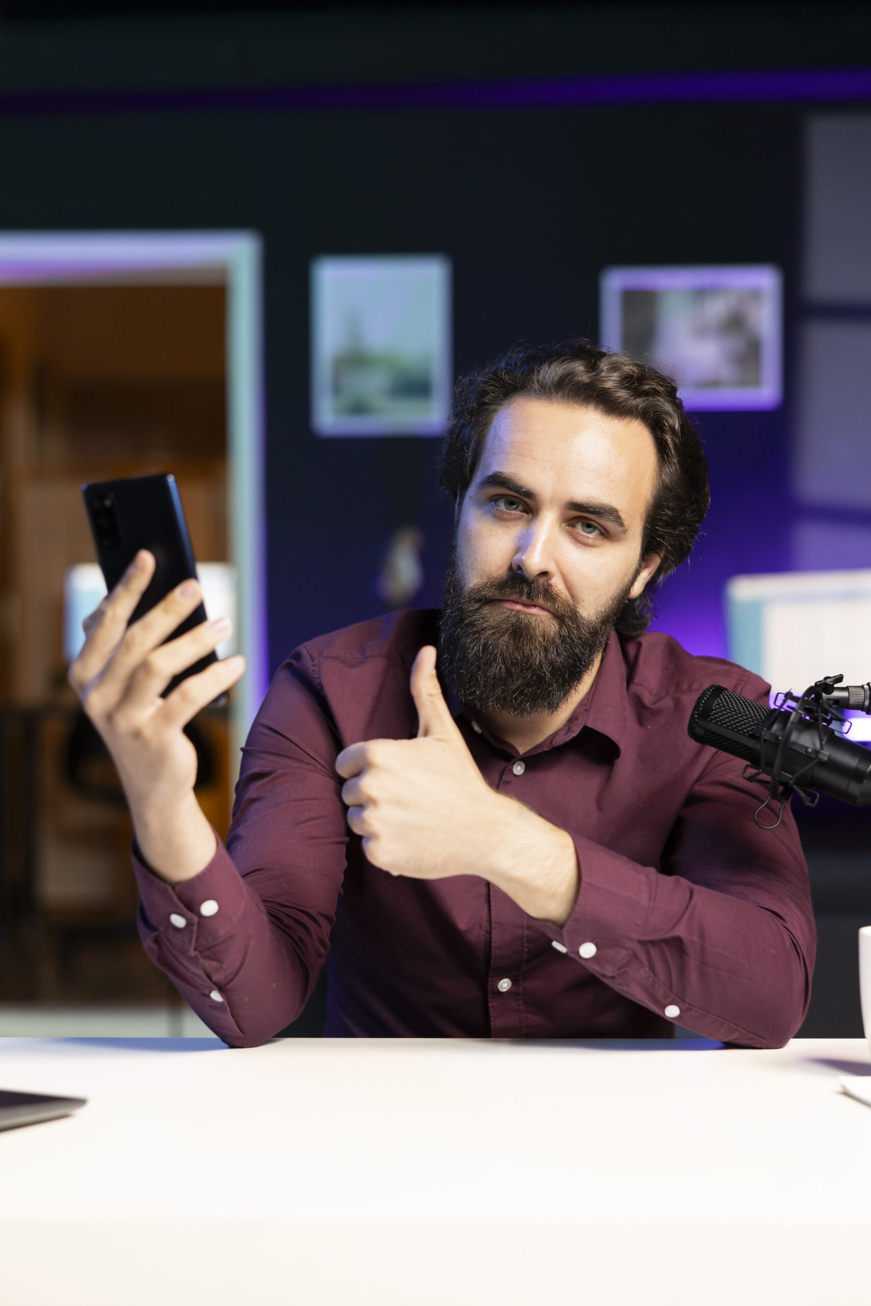 Tech influencer reviewing smartphones for brand collaboration campaign
