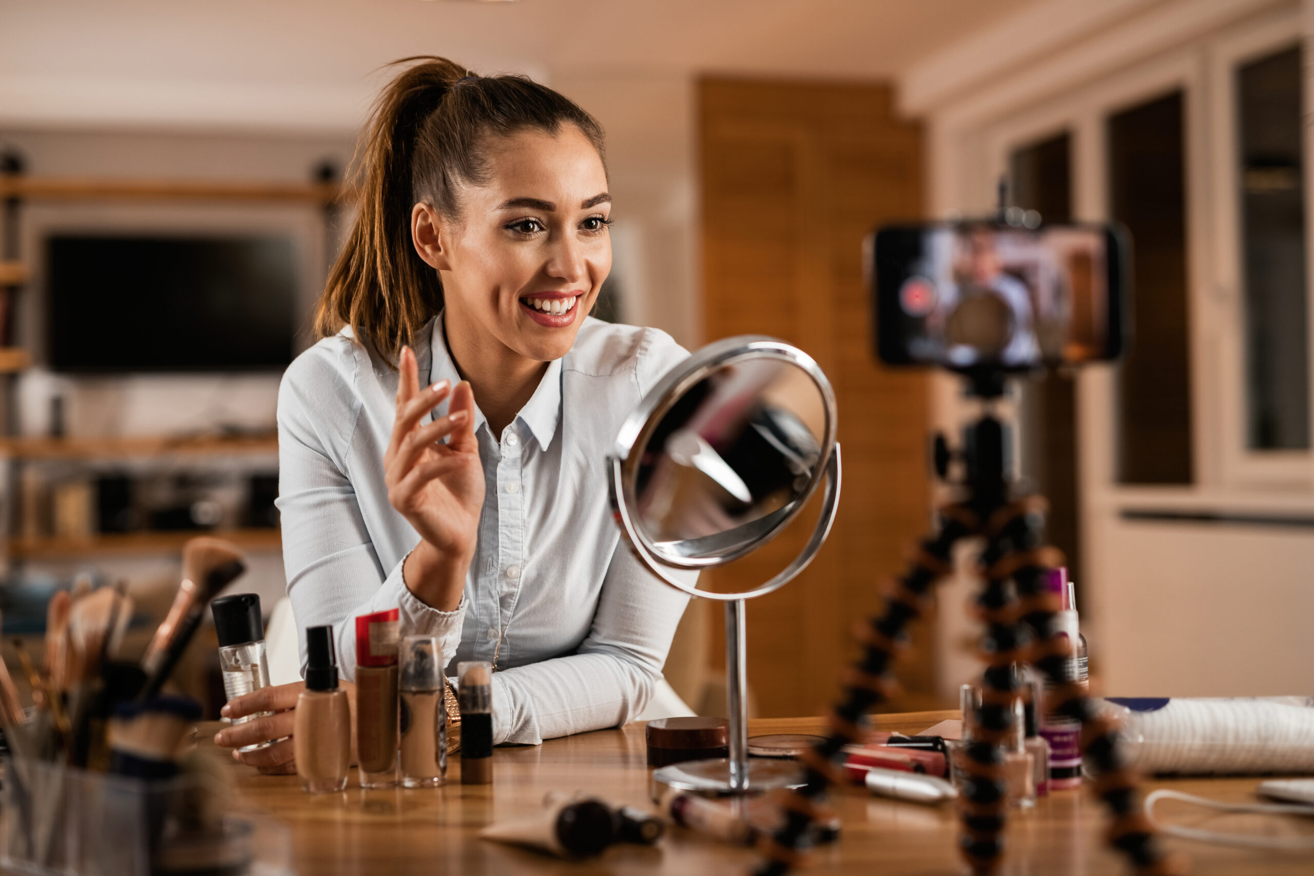 Female influencer creating beauty product review content for brand campaign